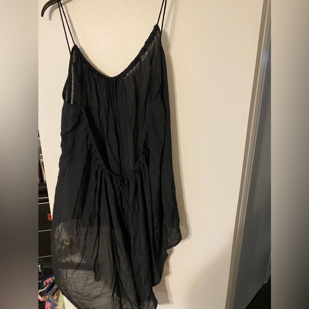 Black swim cover up adjustable. New no tags